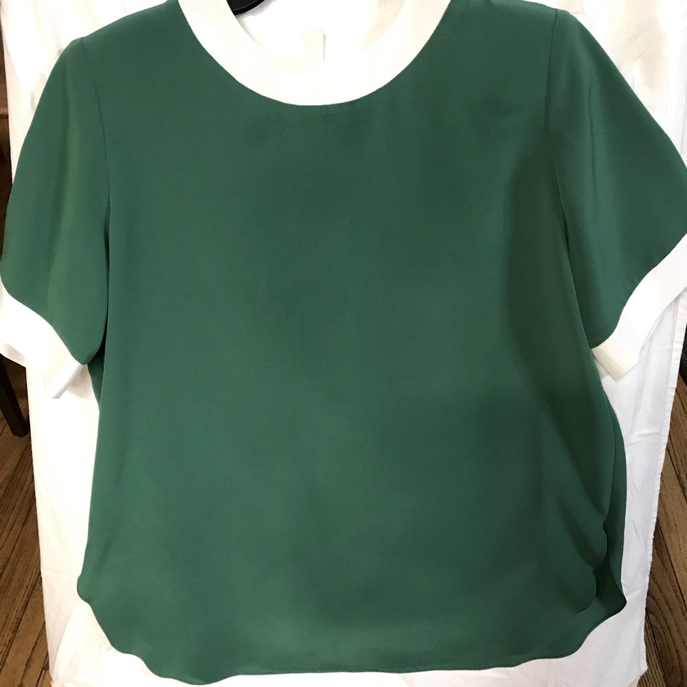 Great condition emerald green with white collar & sleeves.